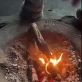 Cat enjoying the campfire