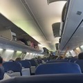 Woman seen inside overhead luggage compartment on Southwest flight