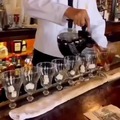 Barista makes 10 Irish coffee at once
