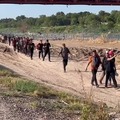 Emergency declared in Eagle Pass, Texas after a surge of migrants invaded the southern border