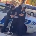 1 arrested man vs 2 female police officers