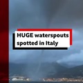 Huge waterspouts have been captured on camera off the Amalfi coast in southern Italy.