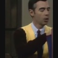 Mr Rogers in a blood stained sweater