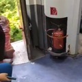 Indian Railway staff dumping trash on the tracks from moving train