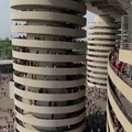 The Stadio Meazza, is a football stadium in Milan. Its walkways are spiral shaped and the motion of the walking people gives you the illusion of an automatic rotation.