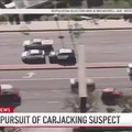 Police pursuit of carjacking suspect